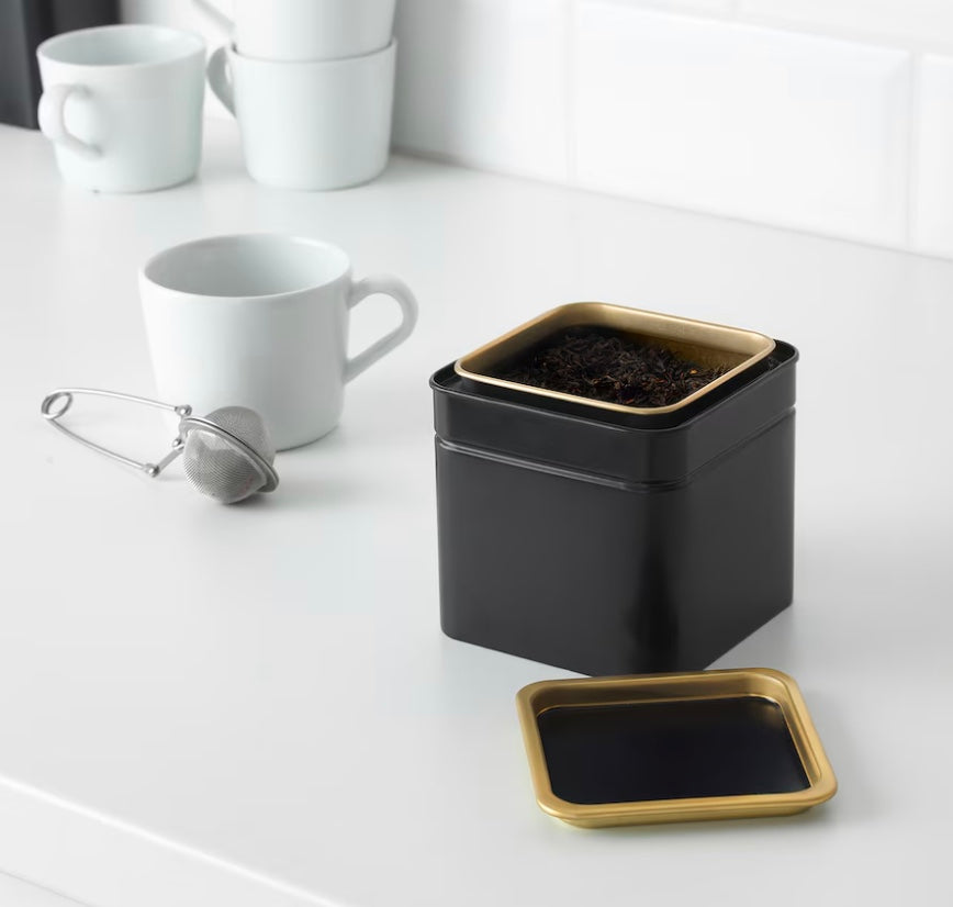 Airtight black metal herb and tea storage